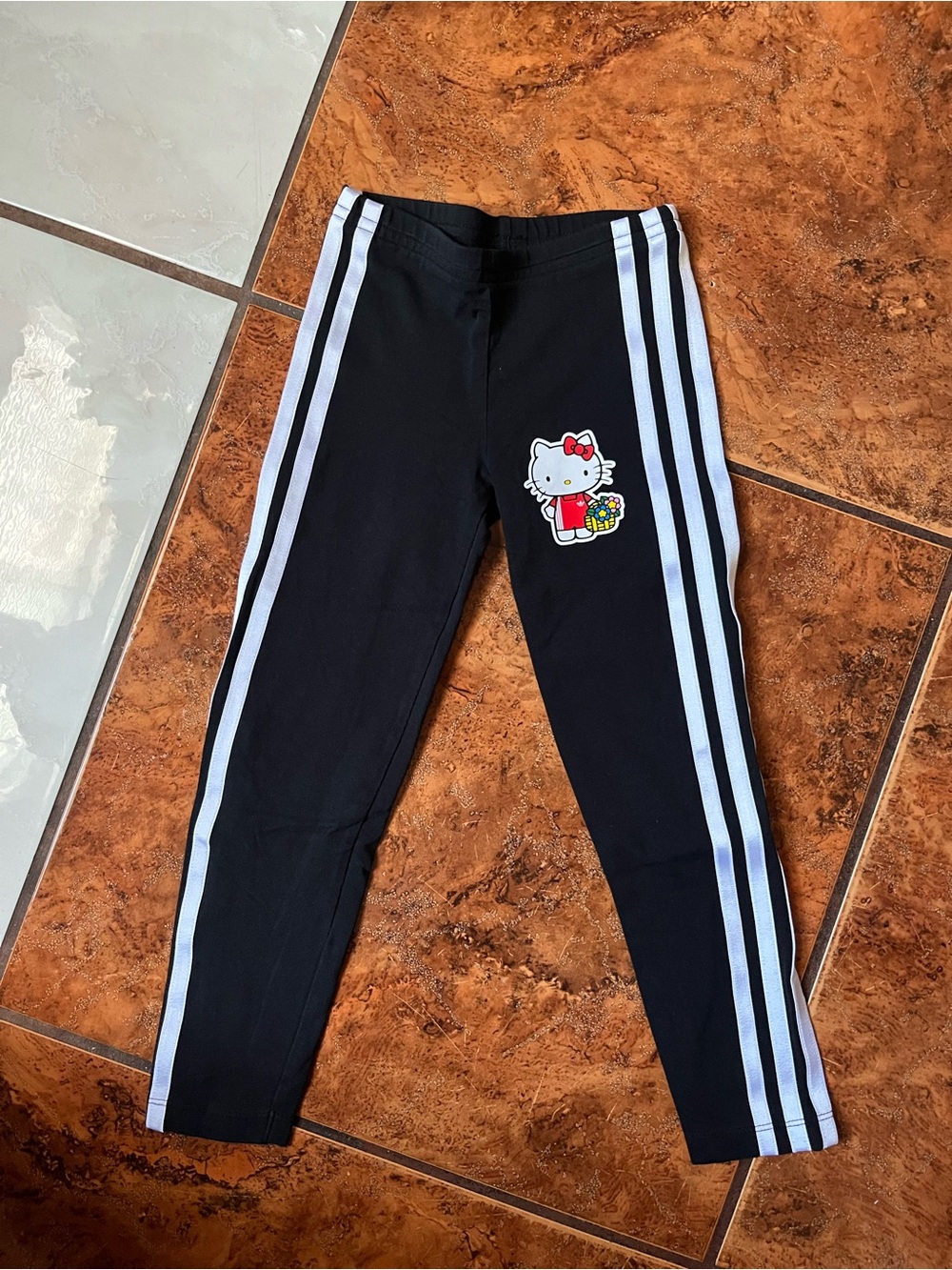 Hello Kitty Black Athletic Leggings with White Stripes